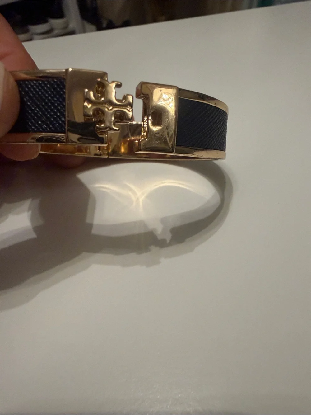 Tory Burch Black and Gold Logo Hinged Bracelet
